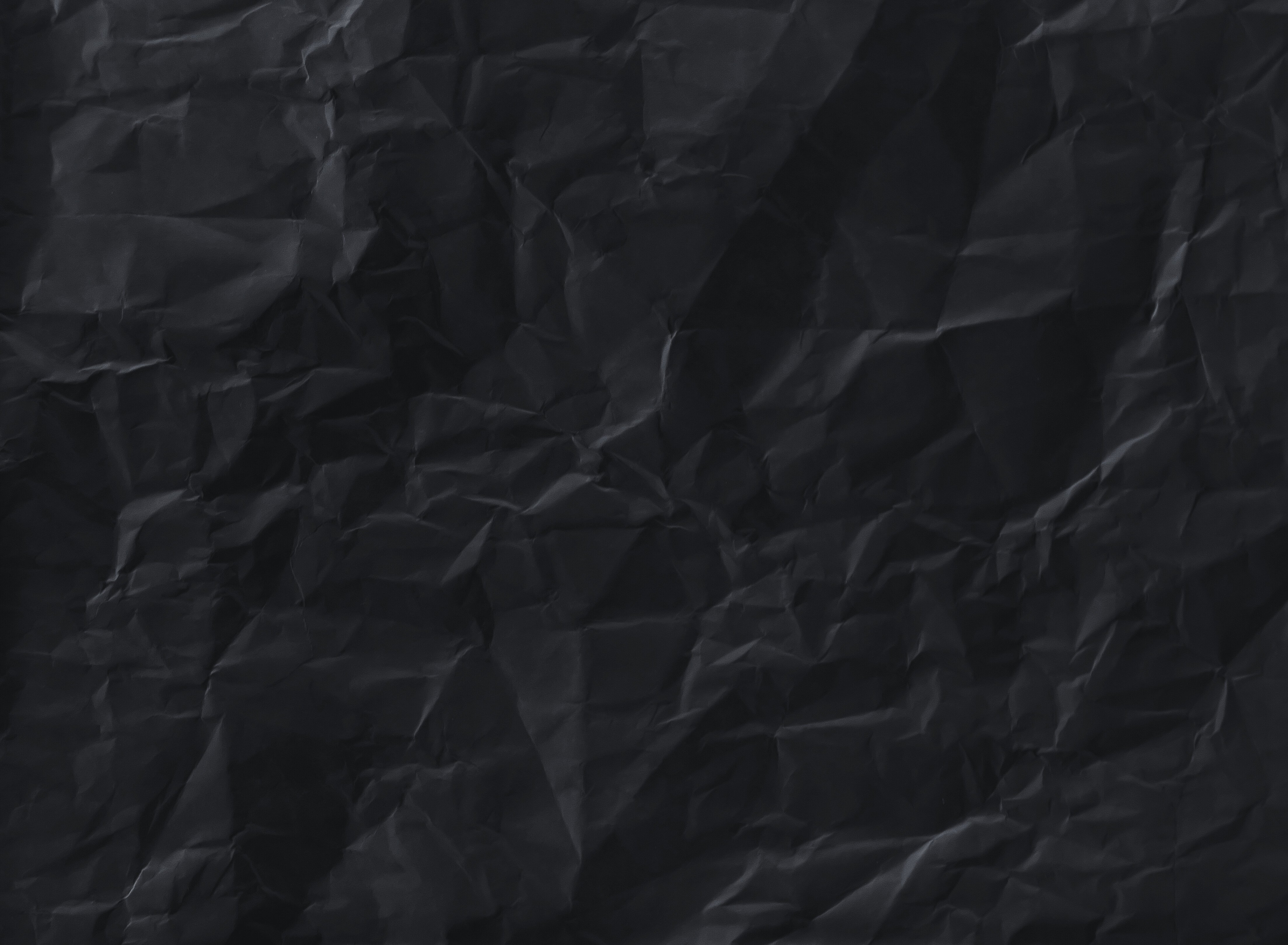 Dark Crumpled Paper Texture Background